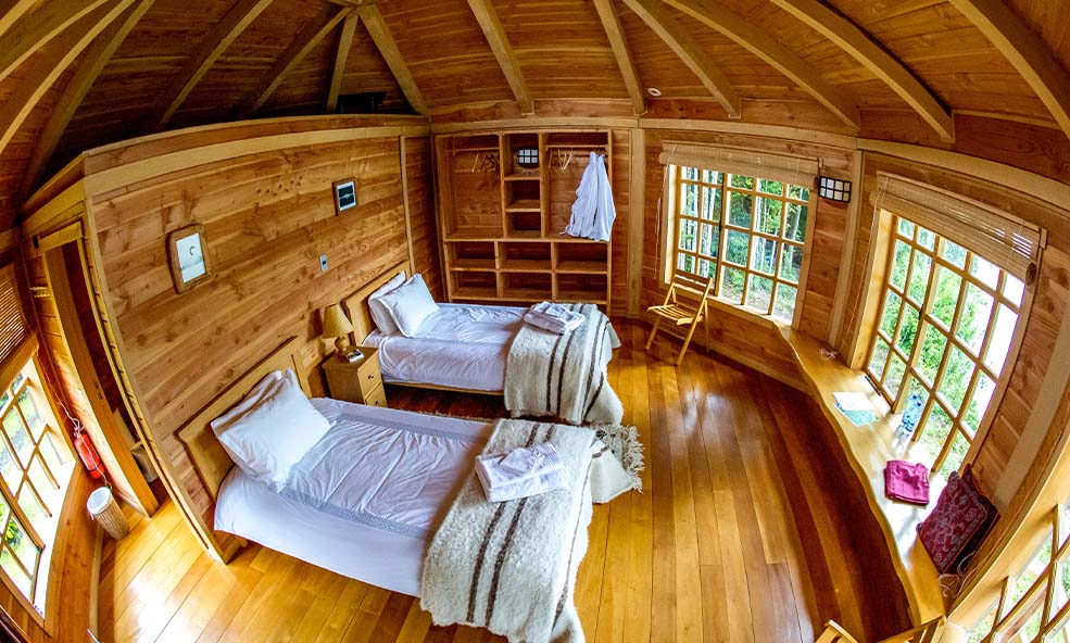 Eleven Experience's Martin Pescador Lodge Twin Bedroom with Patagonia Scenic Views