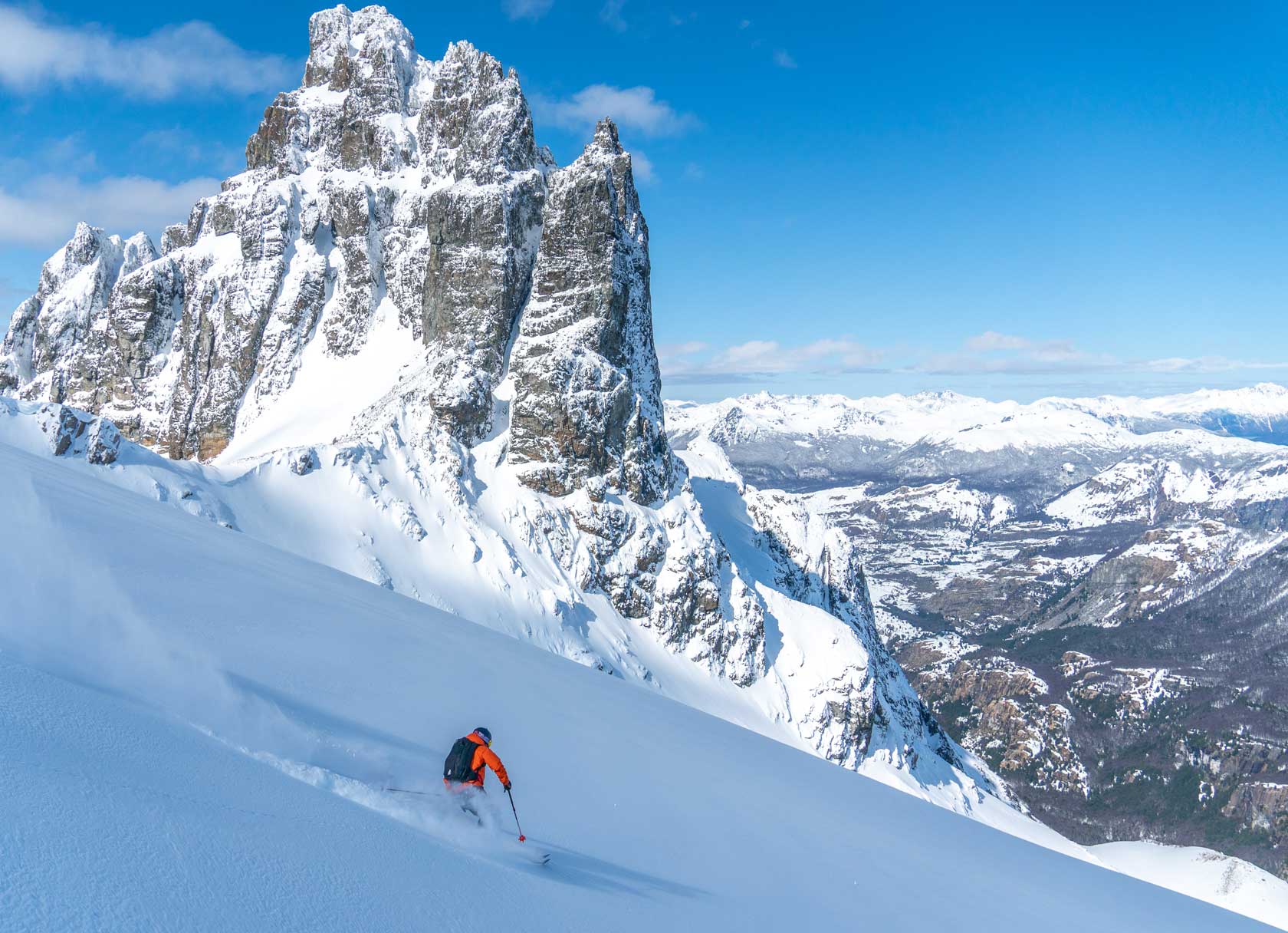 lone skier rides down patagonian mountain
