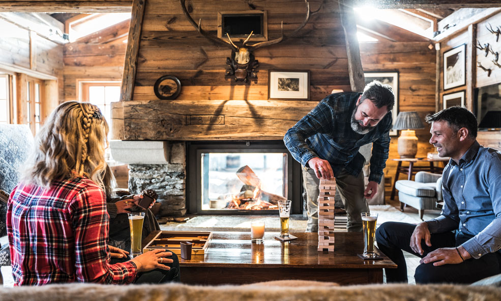 guests playing board games at chalet pelerin