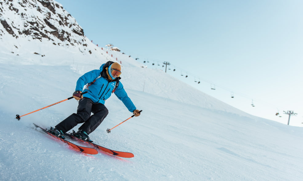 Skier in France with pink skiis